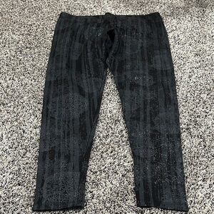 Women’s Black capris leggings, thermal top and a tank top.